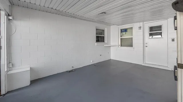 an aerial view of houses with yard