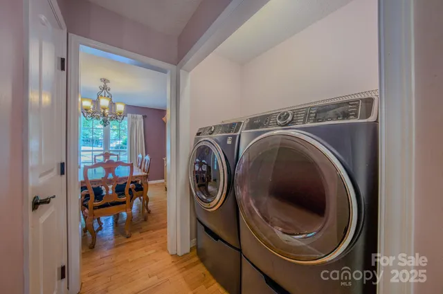 a utility room with dryer and washer