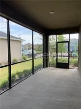a terrace with outdoor seating and city view