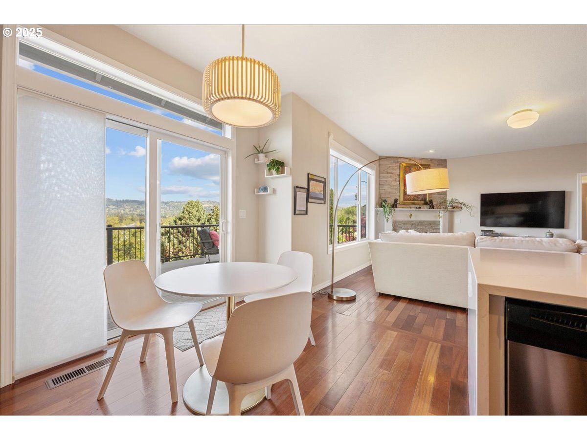 5254 Wedgewood Loop Newberg, OR 97132 - Photo 14 of 43 a view of a dining room with furniture window and wooden floor