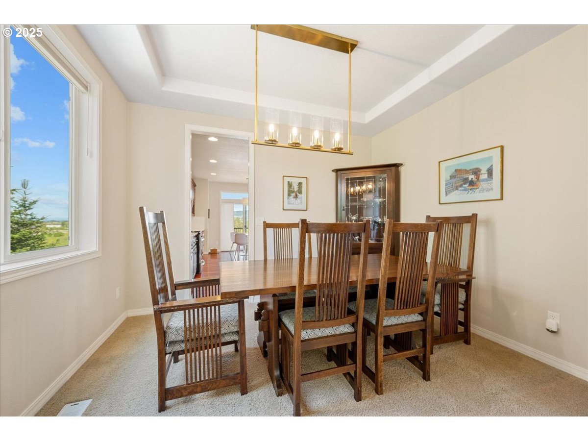 5254 Wedgewood Loop Newberg, OR 97132 - Photo 16 of 43 a view of a dining room with furniture