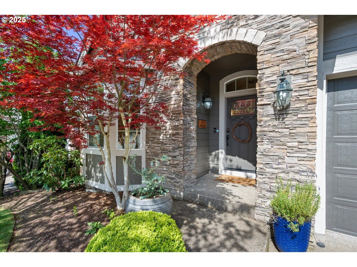 5254 Wedgewood Loop Newberg, OR 97132 - Photo 2 of 43 a front view of a house with a yard