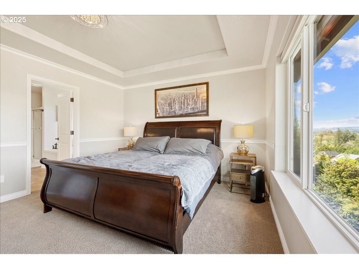 5254 Wedgewood Loop Newberg, OR 97132 - Photo 21 of 43 a bedroom with a bed and a large mirror