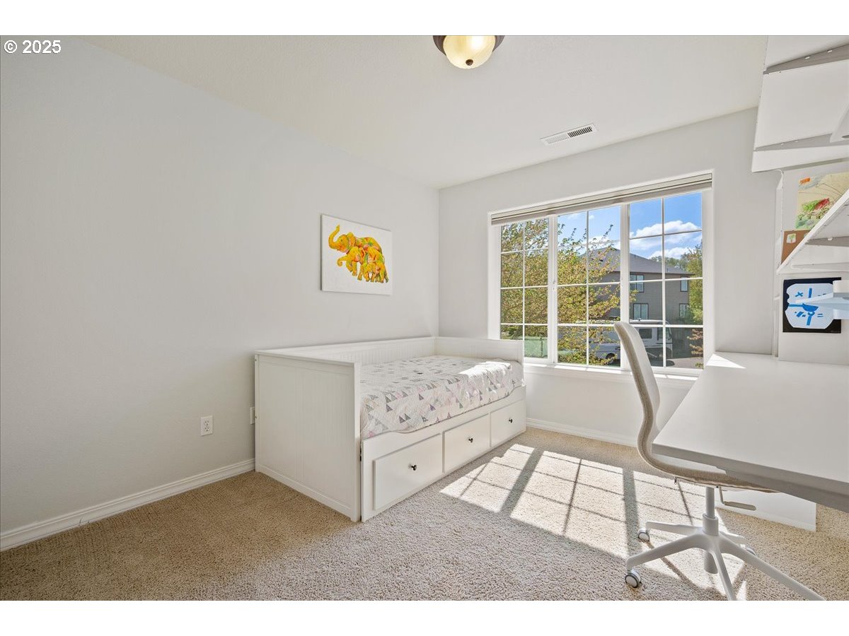 5254 Wedgewood Loop Newberg, OR 97132 - Photo 26 of 43 a living room with furniture and a floor to ceiling window