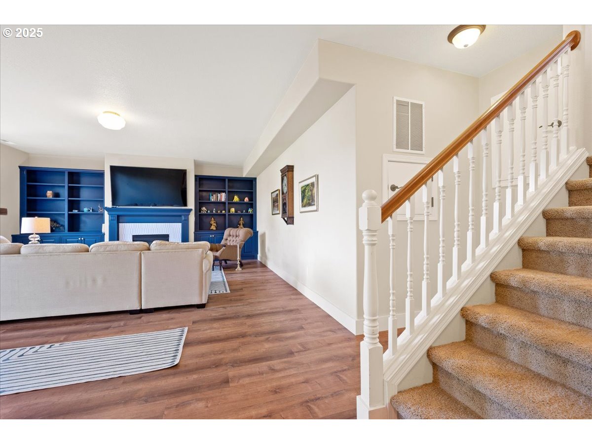 5254 Wedgewood Loop Newberg, OR 97132 - Photo 30 of 43 view of living room with furniture and stairs