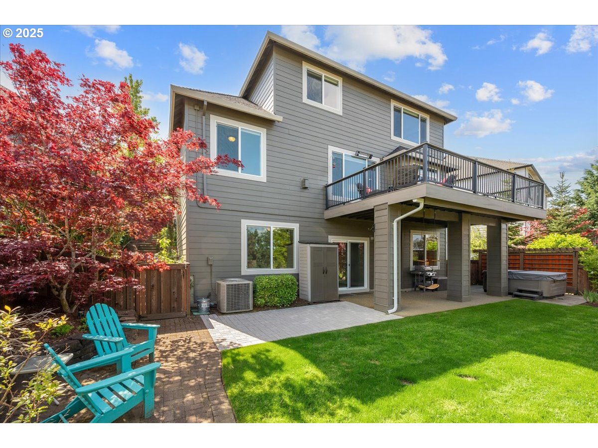 5254 Wedgewood Loop Newberg, OR 97132 - Photo 37 of 43 a view of a house with a yard and potted plants