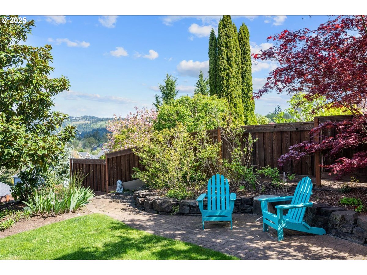 5254 Wedgewood Loop Newberg, OR 97132 - Photo 38 of 43 a view of a backyard with plants and a patio