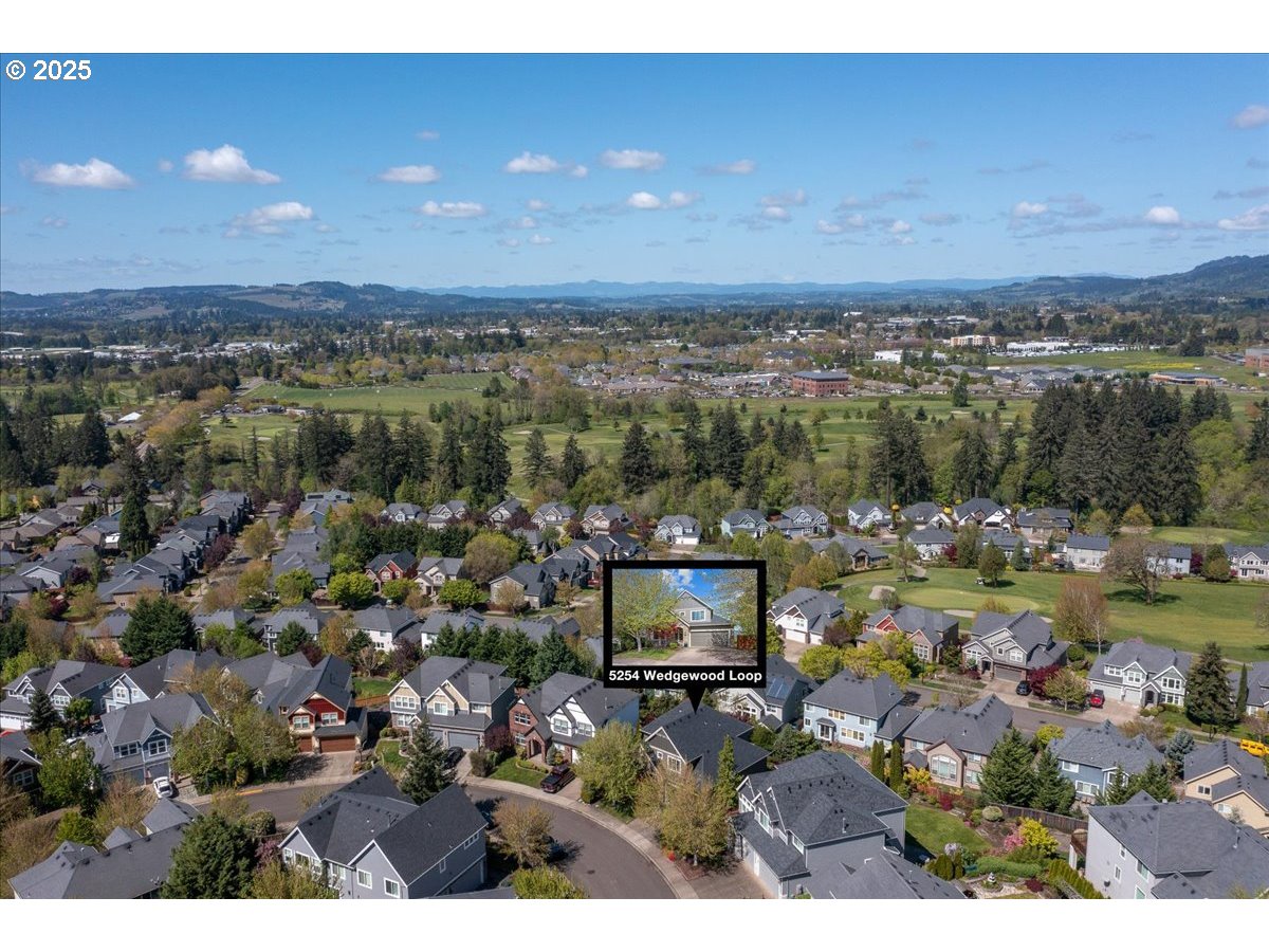 5254 Wedgewood Loop Newberg, OR 97132 - Photo 43 of 43 an aerial view of a house with a garden