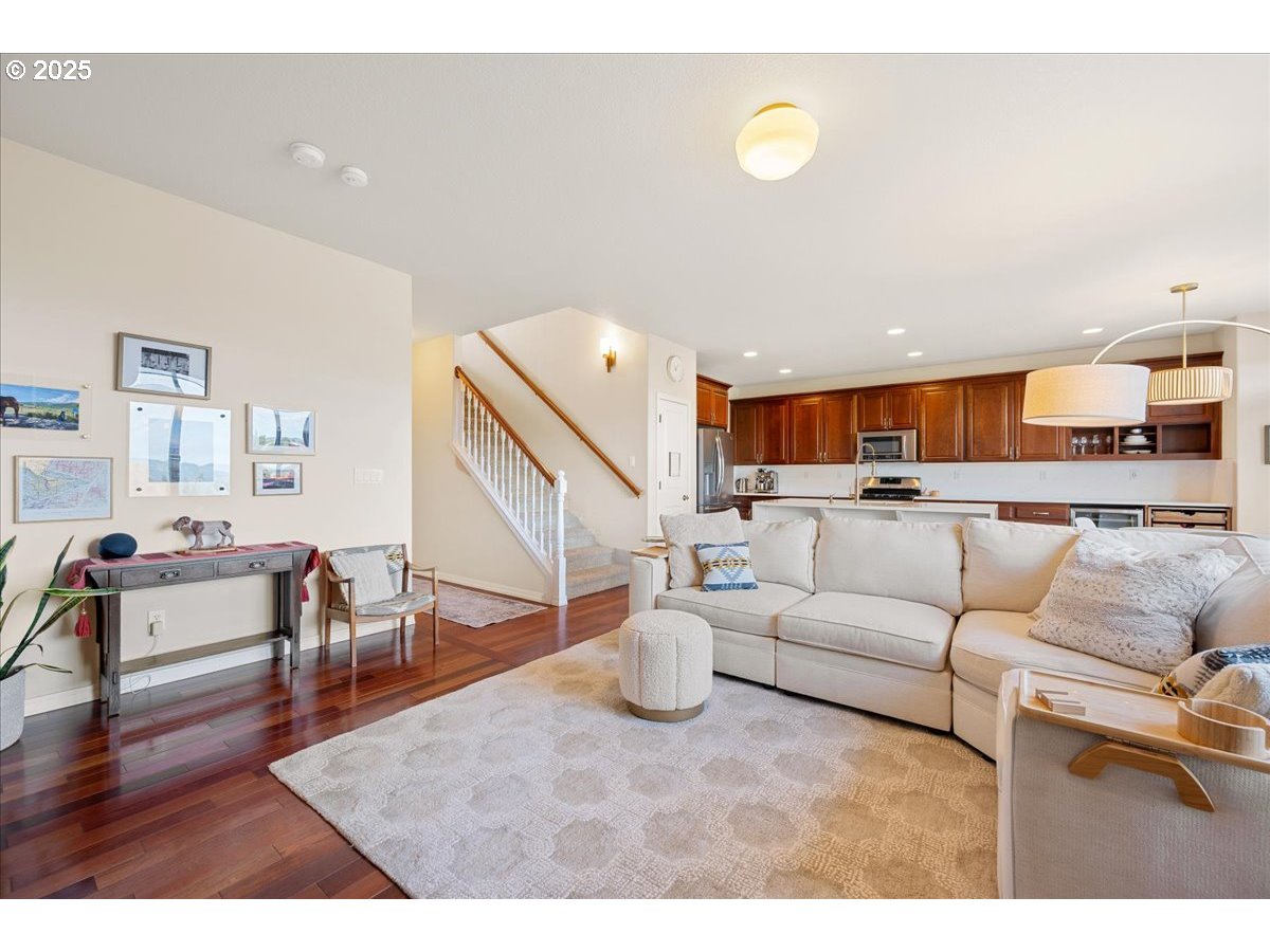 5254 Wedgewood Loop Newberg, OR 97132 - Photo 9 of 43 a living room with furniture and kitchen view