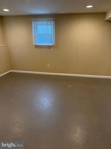 a bathroom with a toilet and a sink