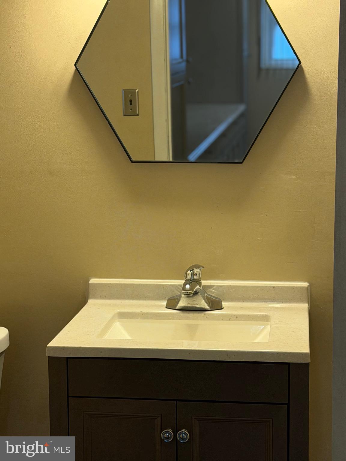 6731 Fox Meadow Road Gwynn Oak, MD 21207 - Photo 43 of 62 Basement Vanity in Powder Room