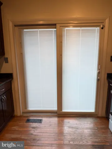 a view of small space with wooden floor