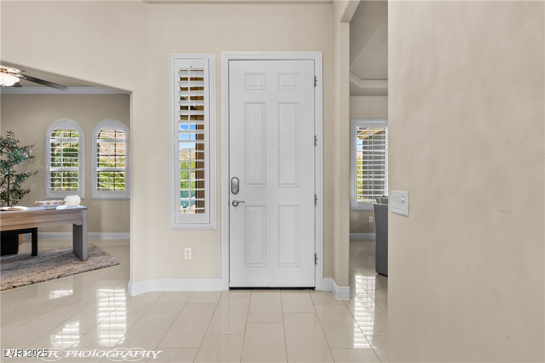 1348 Basin View Mesquite, NV 89034 - Photo 30 of 70 Foyer entrance featuring light tile patterned flooring and ceiling fan