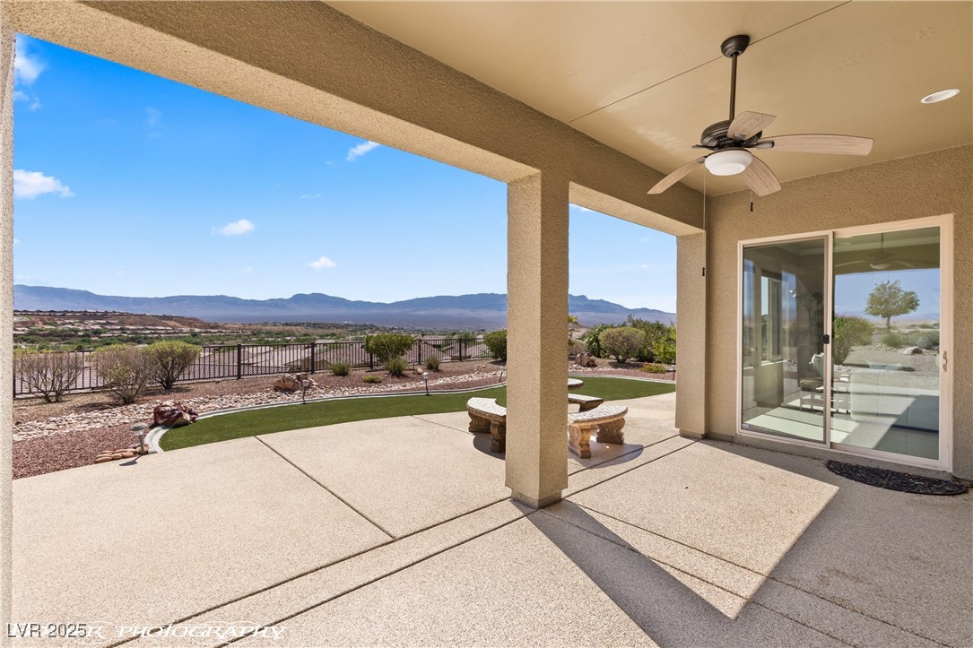 1348 Basin View Mesquite, NV 89034 - Photo 51 of 70 Fenced backyard with a patio, a mountain view, and ceiling fan