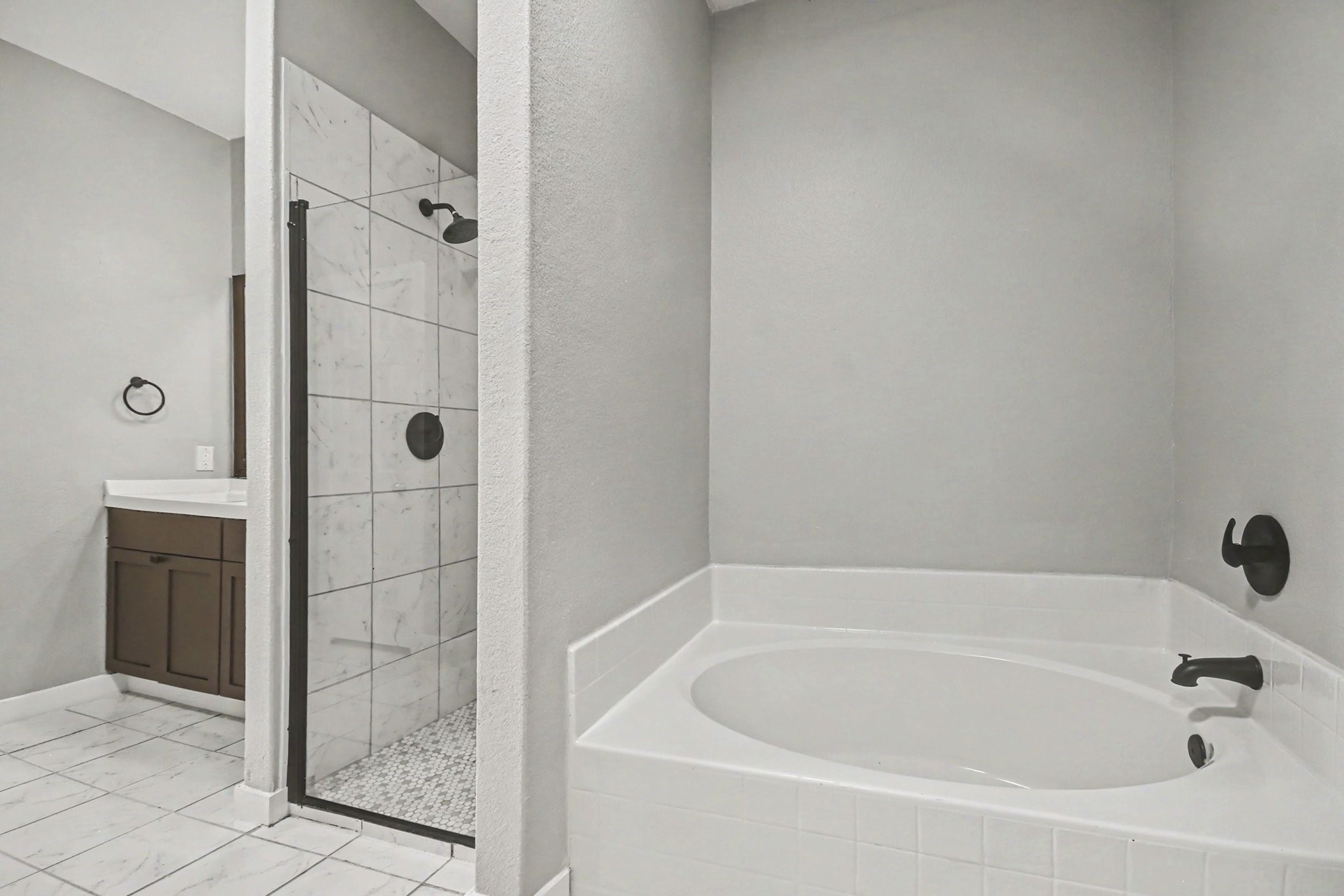 1322 Diamond Drape Drive Rosharon, TX 77583 - Photo 22 of 45 a white bath tub sitting next to a shower