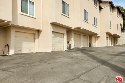 a view of an outdoor space and swimming pool