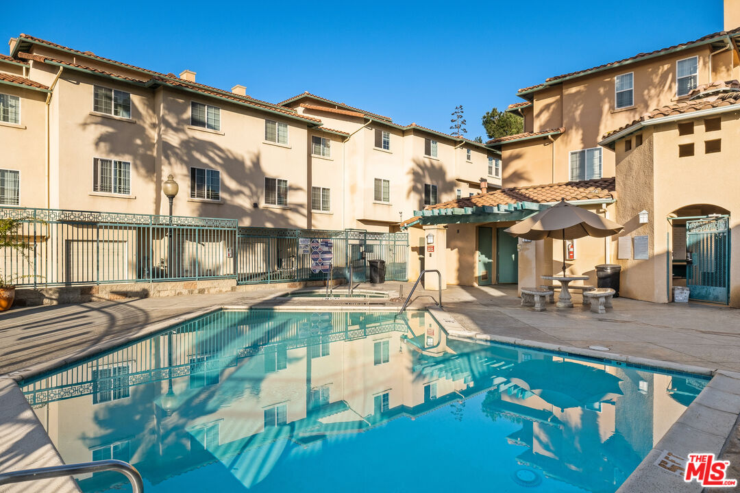 3711 Baldwin Street, Unit 1306 Los Angeles, CA 90031 - Photo 32 of 35 a view of a swimming pool with outdoor seating