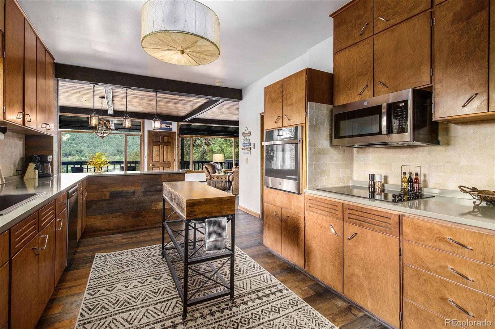 28433 Kinnikinnick Road Evergreen, CO 80439 - Photo 6 of 29