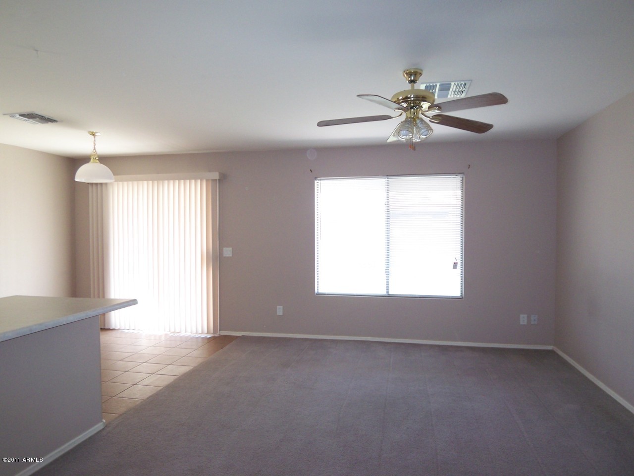 12713 West Calavar Road El Mirage, AZ 85335 - Photo 4 of 16 family room