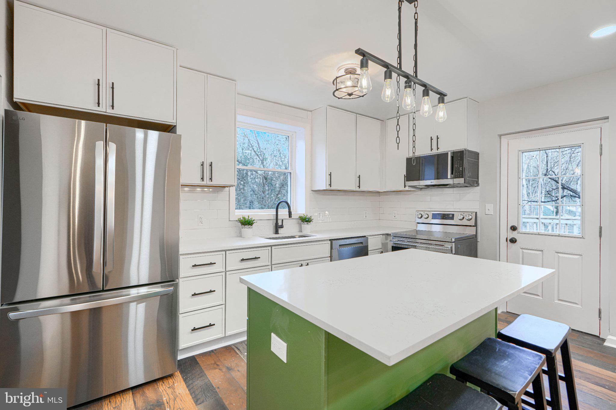 2345 Paper Mill Road Phoenix, MD 21131 - Photo 10 of 49 Kitchen island with seating