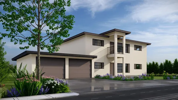 a front view of a house with a garden