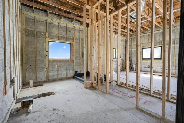 a view of a bathroom with a shower and a sink