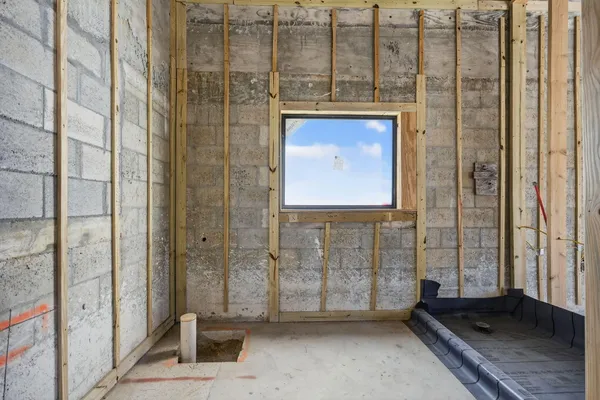 a view of a room with large windows
