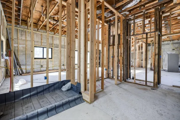 a bathroom with a tub and shower