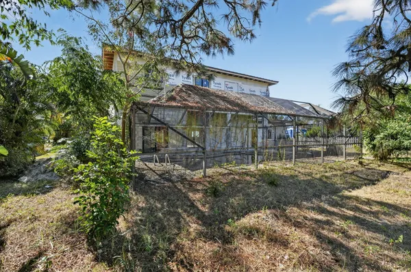 a house with trees in front of it