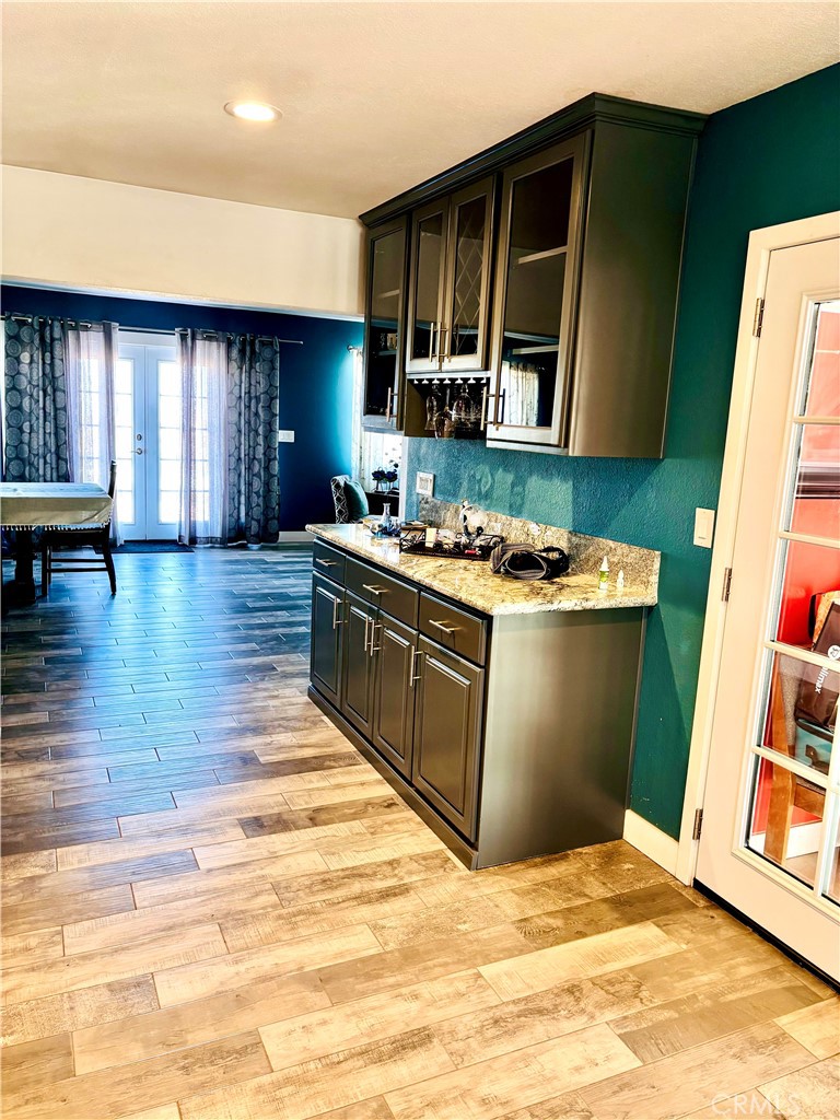 5808 Snow Line Drive Phelan, CA 92371 - Photo 11 of 15 a kitchen with stainless steel appliances granite countertop a sink stove and refrigerator