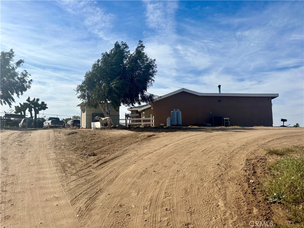 5808 Snow Line Drive Phelan, CA 92371 - Photo 5 of 15 a view of a house with a yard