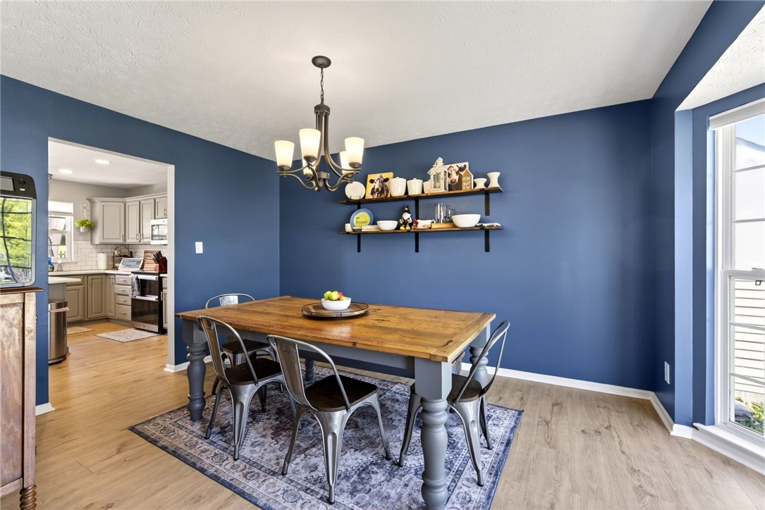 39 Holly Court Springboro, OH 45066 - Photo 7 of 42 This inviting dining area seamlessly connects to the kitchen, creating an ideal space for gatherings.