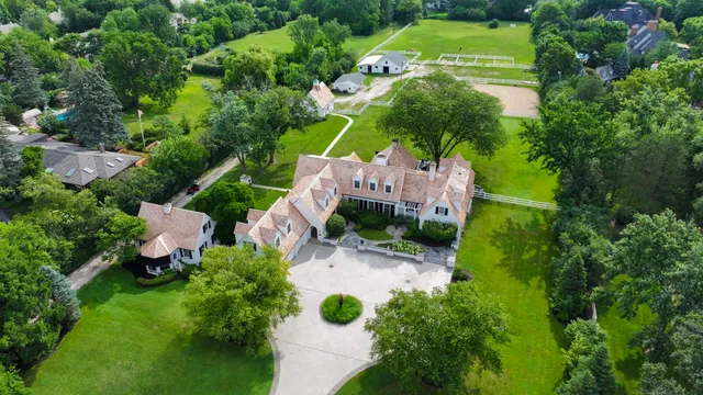 an aerial view of a house with a garden