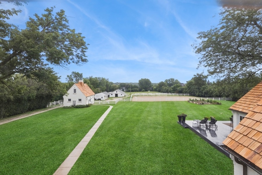6191 South County Line Road Burr Ridge, IL 60527 - Photo 5 of 38 a view of a garden and lake view
