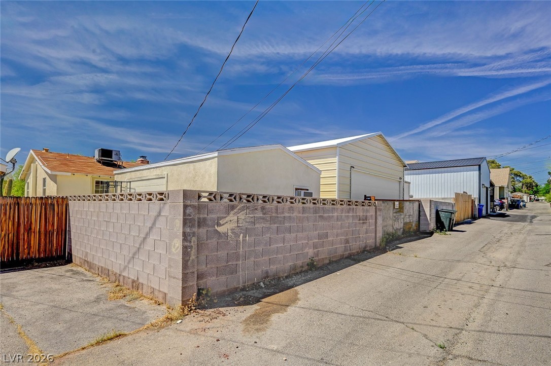 629 L Avenue Boulder City, NV 89005 - Photo 44 of 46 Back-alley way with gated entrance to garage