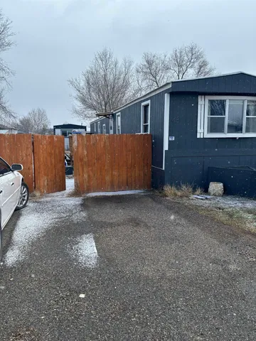 a view of backyard with tree