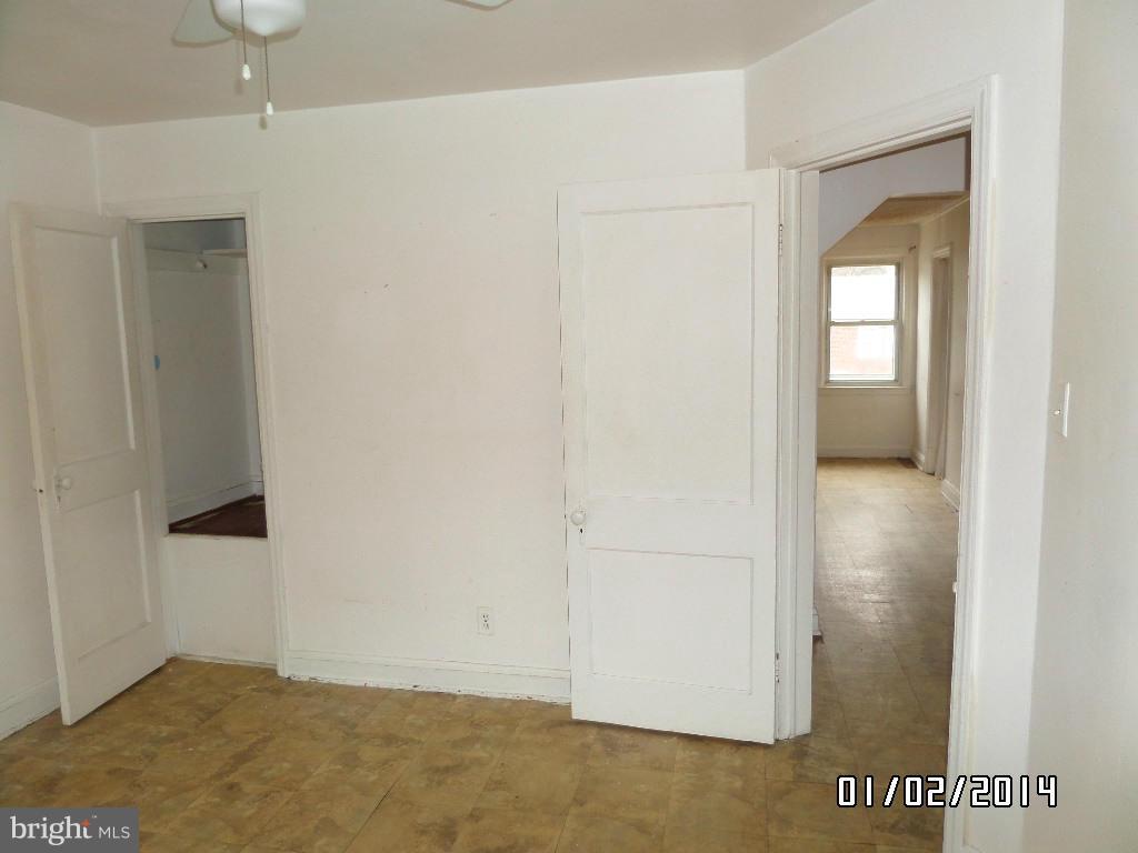 4506 Fairfax Road Baltimore, MD 21216 - Photo 14 of 28 a view of an empty room