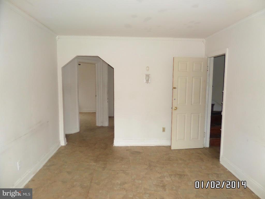 4506 Fairfax Road Baltimore, MD 21216 - Photo 3 of 28 a view of an empty room