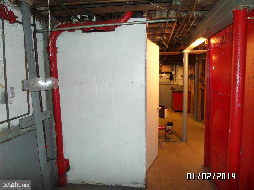 4506 Fairfax Road Baltimore, MD 21216 - Photo 24 of 28 a utility room with dryer and washer