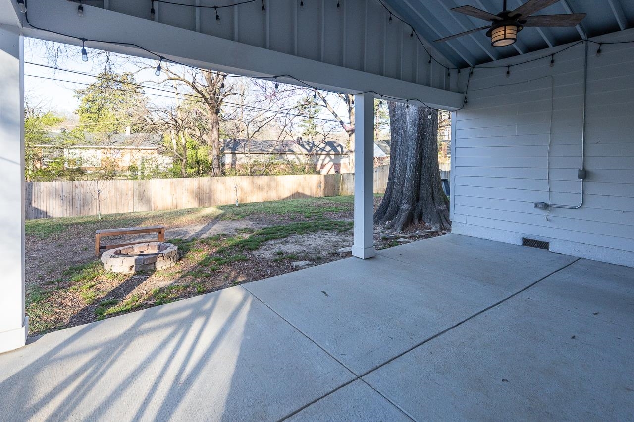 401 Green Acres Road Memphis, TN 38117 - Photo 28 of 34 a view of a room with wooden floor and outdoor space