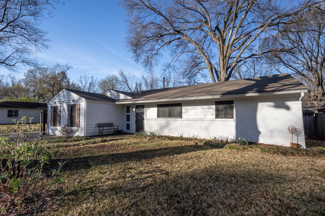 401 Green Acres Road Memphis, TN 38117 - Photo 3 of 34 a view of a house with a yard
