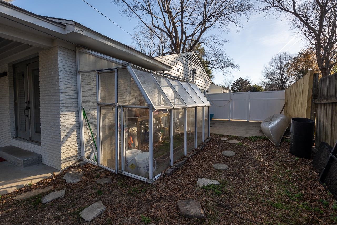 401 Green Acres Road Memphis, TN 38117 - Photo 33 of 34 a view of a house with a yard