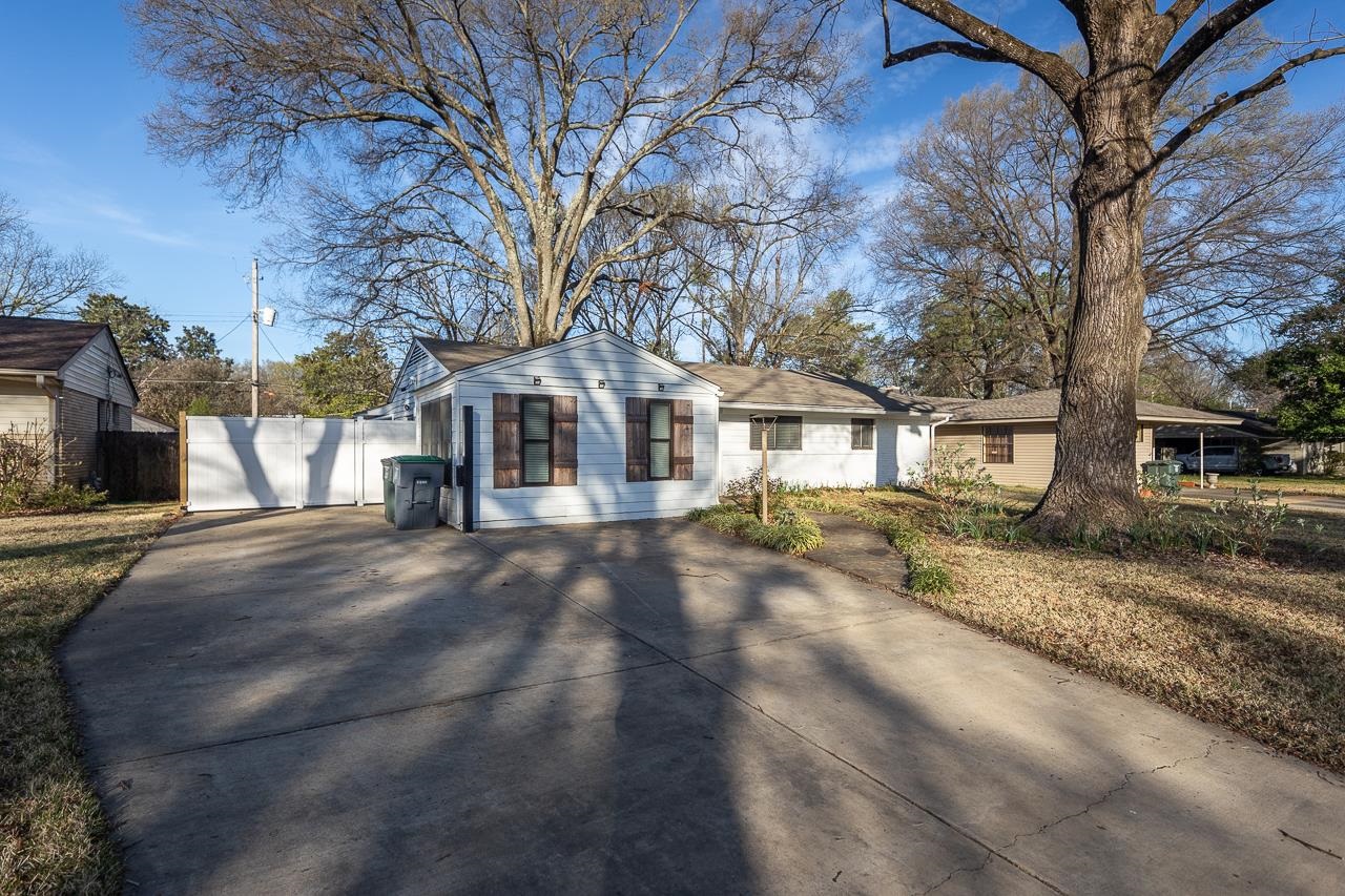401 Green Acres Road Memphis, TN 38117 - Photo 34 of 34 a view of a house with a yard