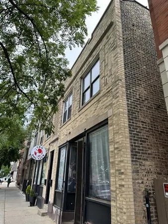 a view of a pathway along the building