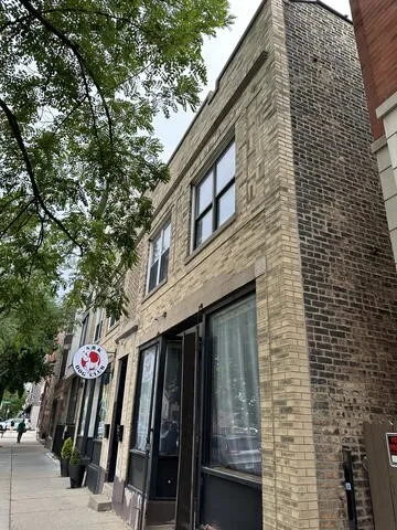 a view of a pathway along the building