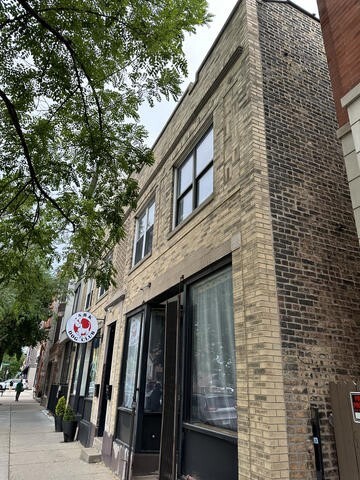 a view of a pathway along the building