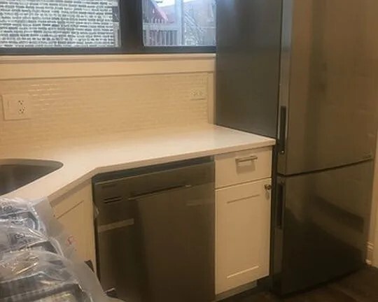 1524 North Ashland Avenue Chicago, IL 60622 - Photo 36 of 38 a utility room with dryer and washer