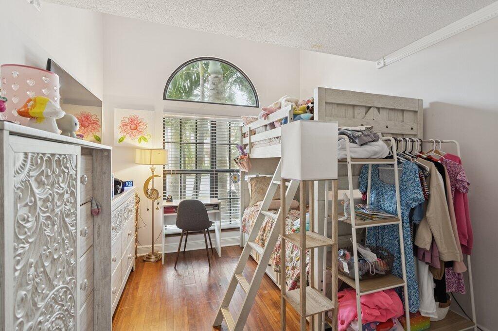 10272 Hidden Springs Court Boca Raton, FL 33498 - Photo 12 of 25 a view of a livingroom with furniture and workspace