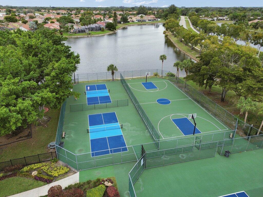 10272 Hidden Springs Court Boca Raton, FL 33498 - Photo 24 of 25 an aerial view of a house