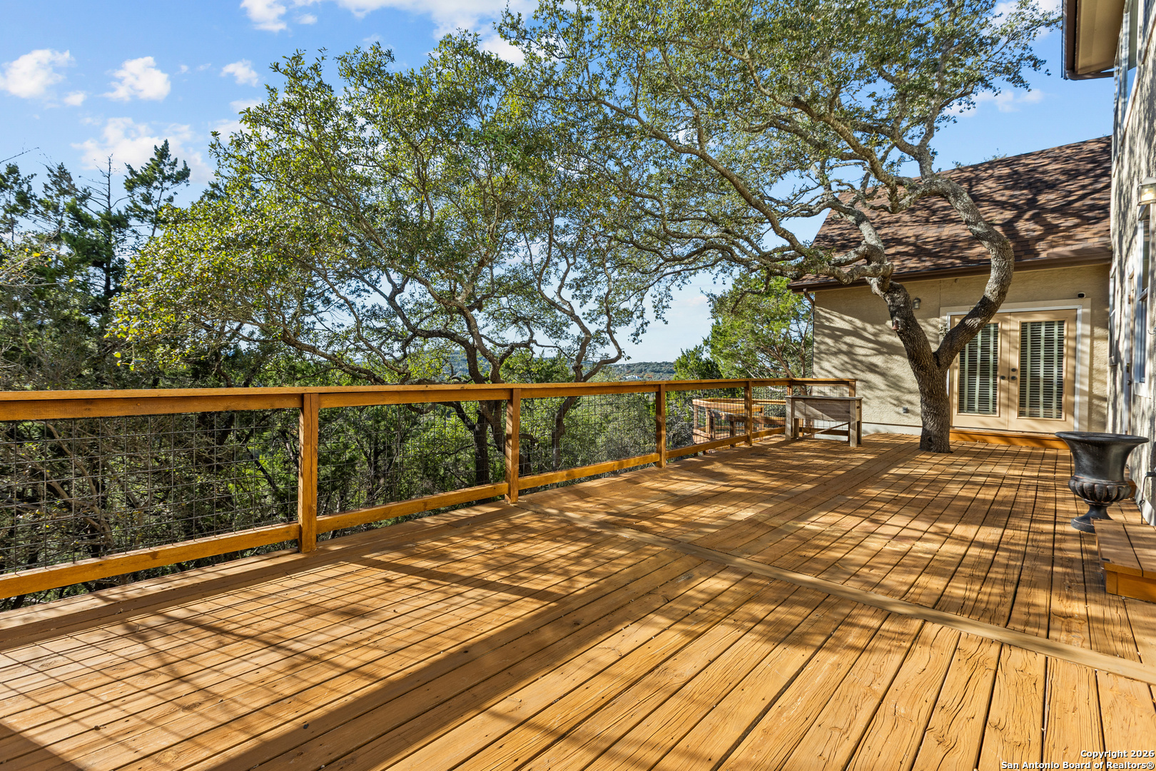 250 Misty Brook Spring Branch, TX 78070 - Photo 33 of 47 a view of a balcony with wooden floor